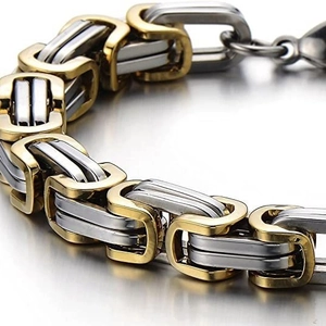 Men's two-tone gold and silver stainless steel Byzantine chain bracelet in a 45-degree angle