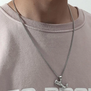 Silver soccer cleats and football pendant necklace with box chain for sports fans