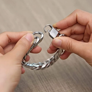 Detailed close-up of heavy duty stainless steel Cuban link bracelet with lobster clasp