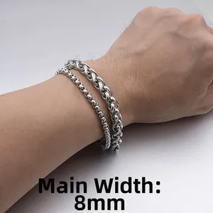 Detail shot of a double-layered titanium steel men's bracelet with 8mm curb and box chain