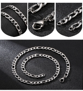 Detailed macro view of the silver Figaro chain necklace with a secure lobster clasp