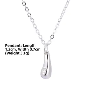 Detail of silver S925 teardrop necklace showing polished surface and size 1.3cm x 0.7cm