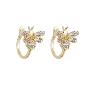 Golden bee ear cuff with sparkling zircon wings in a C-shaped clip-on design