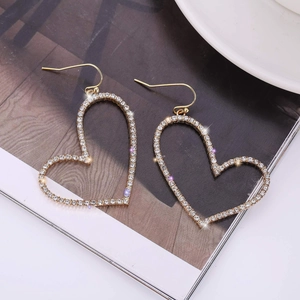 Elegant hollow heart drop earrings with gold finish and sparkling zircon stones