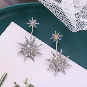 Elegant silver snowflake stud earrings with sparkling crystals in a dual star design