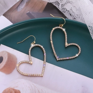 Fashionable hollow heart-shaped drop earrings with sparkling crystals in a gold-plated finish