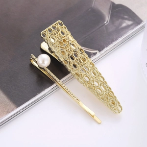 Set di fermagli per capelli dorati minimalisti con perla bianca e design geometrico