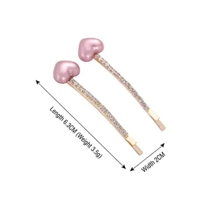 Elegante Haarklammern mit rosa Herzperlen und Strass auf goldener Legierung