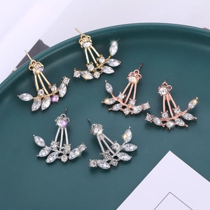 Elegant leaf-shaped crystal earrings in gold, rose gold and silver finishes with white zircons