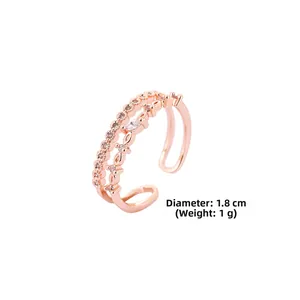 Detail view of rose gold adjustable ring with round and oval cubic zirconia stones