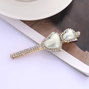 Elegante fermaglio per capelli con perle a cuore dorate e strass brillanti da donna