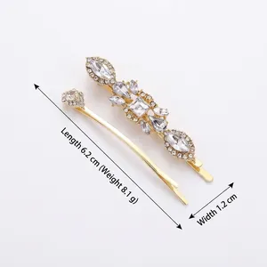 Minimalist rhinestone hair clip set with marquise crystals and golden metal finish