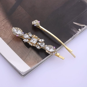 Elegant gold-plated rhinestone hair clip set featuring marquise and square crystals