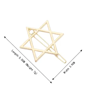 Polished gold hexagram star metal hair clip with measurements 5.5cm by 3.9cm