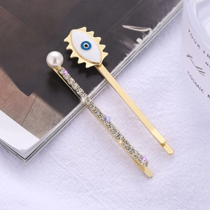 Set de pinzas para el cabello con diseño de ojo, diamantes de imitación y perla