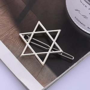Polished silver hexagonal star hair clip with a minimalist hollow metal design