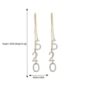 Boucles d'oreilles 520 à pampilles dorées avec diamants, hauteur 7,6 cm et largeur 0,9 cm