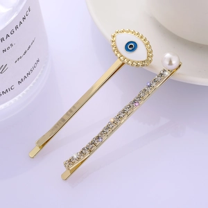 Evil eye hairpin set with pearls and rhinestones on a gold-plated base for women