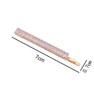 Elegant rose gold hair clip with clear zircon crystals and dimensions 7cm by 0.7cm