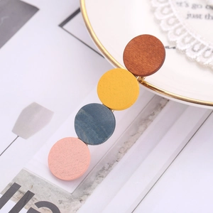 Minimalist geometric wooden hair clip with colorful round patches and French vintage design