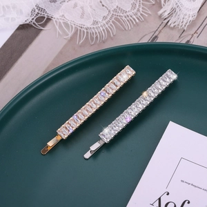 Elegant gold and silver minimalist hair clips with rectangular zircon crystals