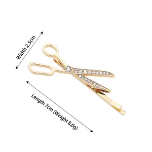 Barrette à cheveux créative en forme de ciseaux dorés avec strass blancs étincelants