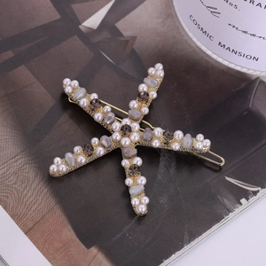 Elegante fermaglio per capelli a stella marina con perle bianche e cristalli grigi