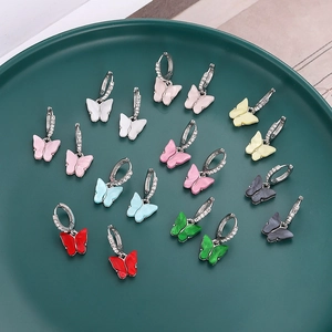 Set of colorful acrylic butterfly hoop earrings with sparkling crystal accents