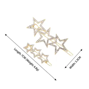 Set of two sparkling rhinestone star hair clips with gold metal base and dimensions