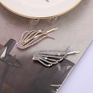 Ensemble de barrettes à strass en forme d'ailes, finitions or et argent pour femmes
