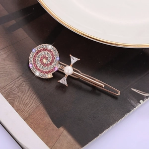 Barrette sucette élégante avec strass roses et perle sur base dorée