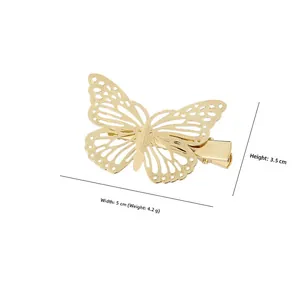 Detailed view of golden butterfly hair clip with dimensions 5cm width and 3.5cm height