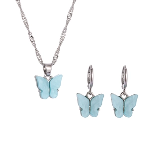 Vintage light blue resin butterfly necklace and earrings set with silver-toned chain