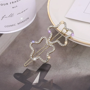 Elegante fermaglio per capelli dorato con strass brillanti e fiori da donna