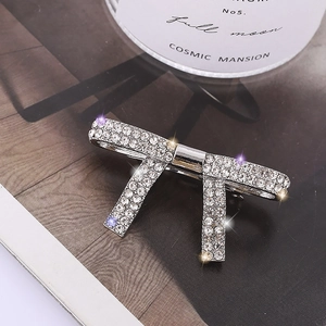 Eleganter silberner Schleifen-Haarclip mit Strasssteinen in minimalistischem Design