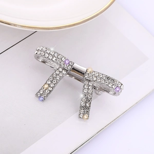 Eleganter Strass-Haarclip in Schleifenform mit lila und champagnerfarbenen Akzenten