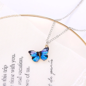 Elegant gradient blue and purple butterfly pendant necklace with golden metal edges