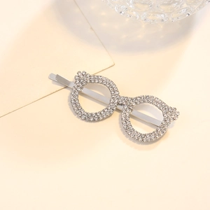 Barrette à cheveux créative en forme de lunettes avec cristaux et finition argentée élégante