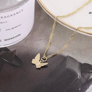 Minimalist gold butterfly pendant necklace with elegant water wave chain for women