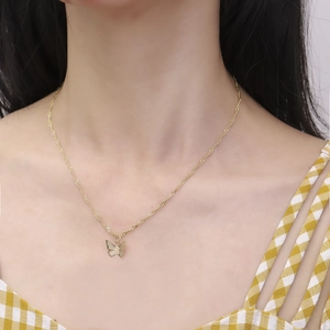 Elegant gold butterfly pendant necklace for women worn on neck for minimalist daily style
