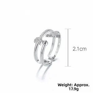 Detail of double-layer star and heart open ring with weight and size specifications