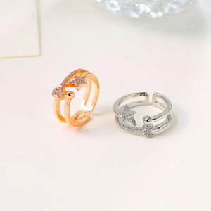 Double layered star ring with zircon stones in rose gold and silver finish
