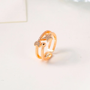 Rose gold adjustable double-layer ring featuring pavé star and moon celestial motifs