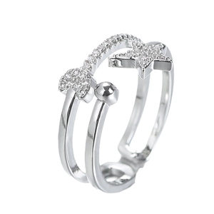 Double layered silver ring with zircon star and polished bead detail in open design