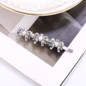 Eleganter Strass-Haarclip mit Schleifen-Design und Kristallen auf silbernem Metall für Damen