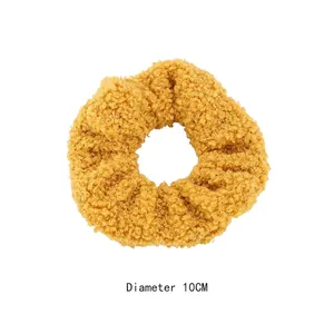 Ginger yellow sherpa fleece scrunchie with 10cm diameter and soft textured finish