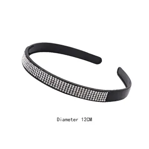 Black headband with three rows of sparkling white rhinestones, 12cm diameter