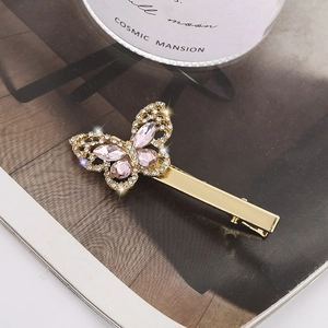 Eleganter goldener Schmetterlings-Haarclip mit rosa Kristallen und Strasssteinen
