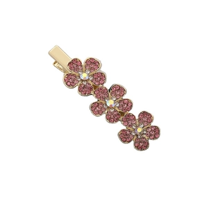 Eleganter goldener Haarclip mit drei rosa Strassblumen und schillernden Mittelkristallen