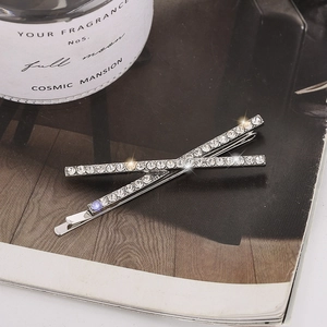 Elegant silver alloy cross hair clips with sparkling rhinestones in a luxury style